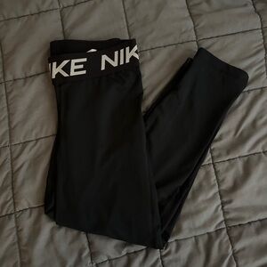 Black nike leggings, cropped women’s small